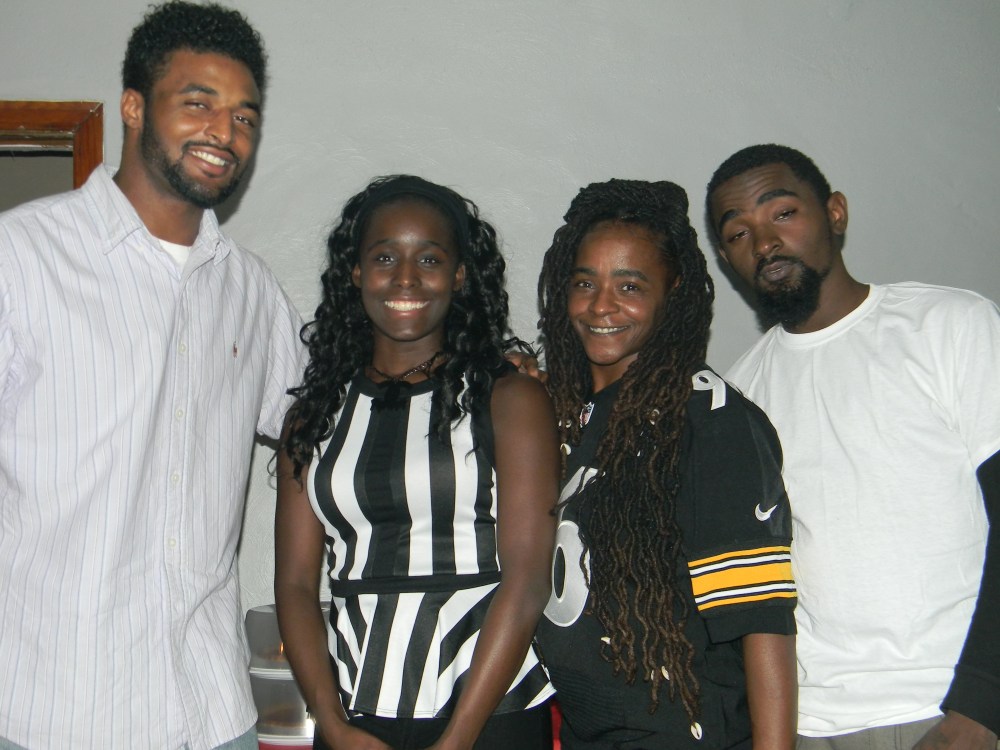 My older brother, me, my mother, and my younger brother. 